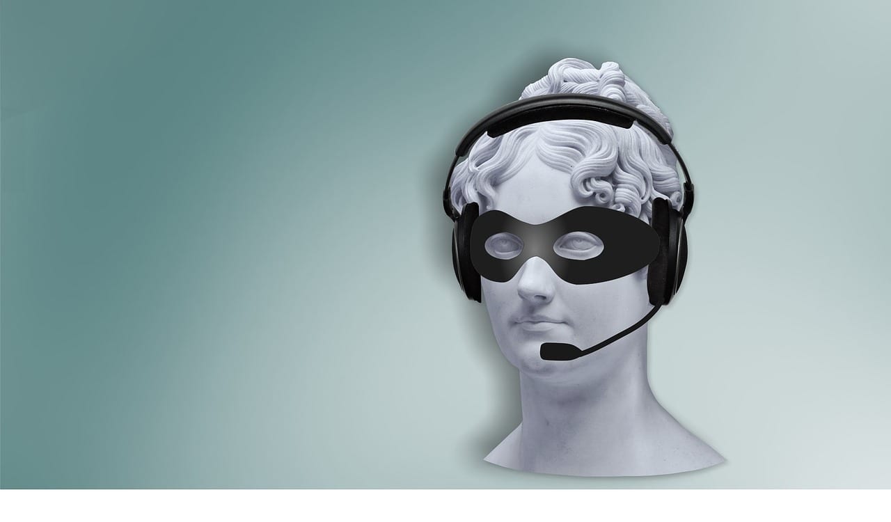 Image of a female statue wearing a mask and headset