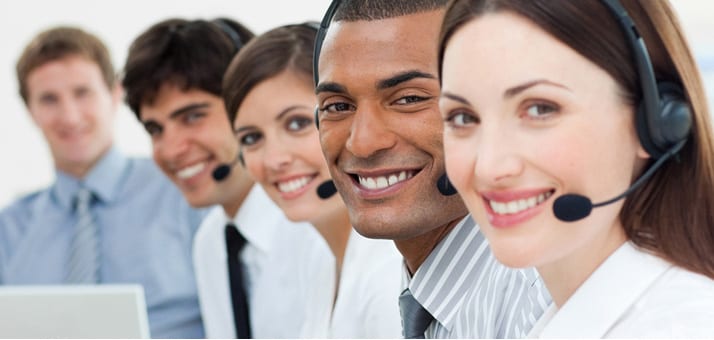 Image of call center agents providing answering service for business