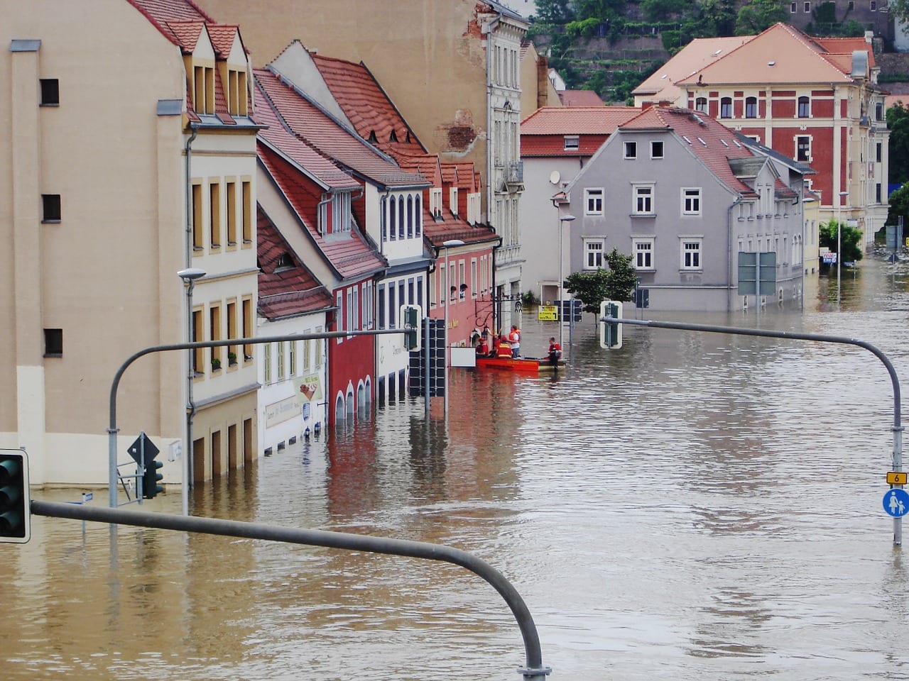 Image of a flooded city in need of a business disaster recovery plan