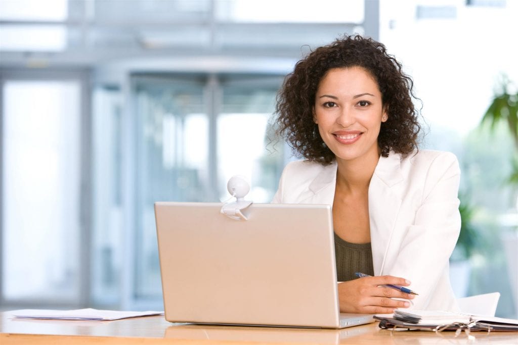 woman at desk with computer