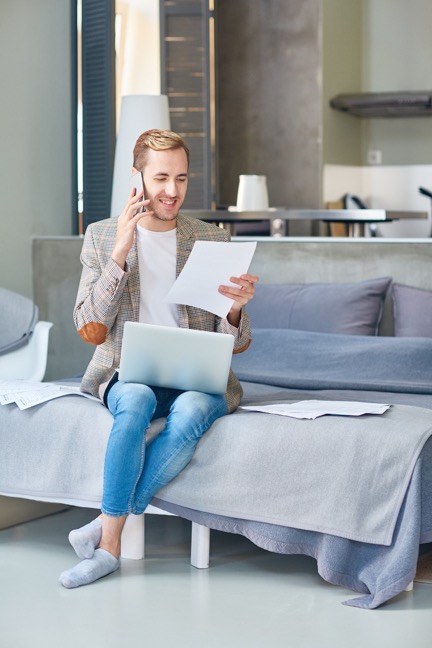 man on phone in apartment