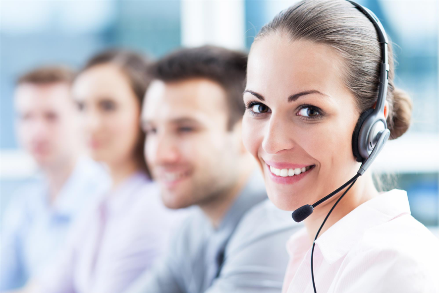 smiling answering service representatives