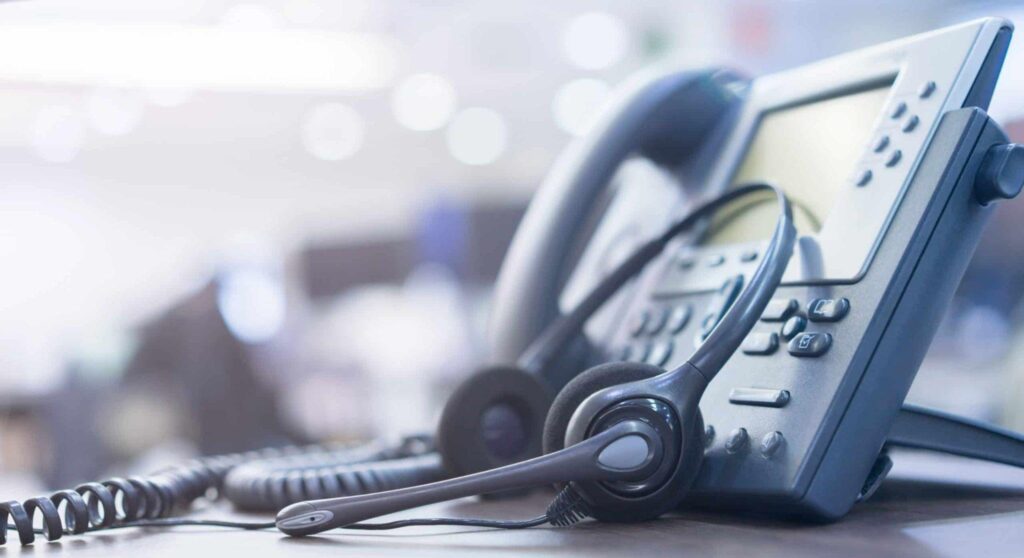 Business phone on desk.