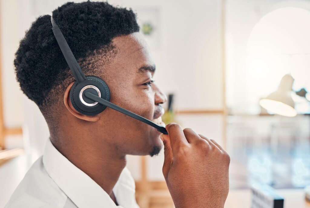 Customer service agent with headset.