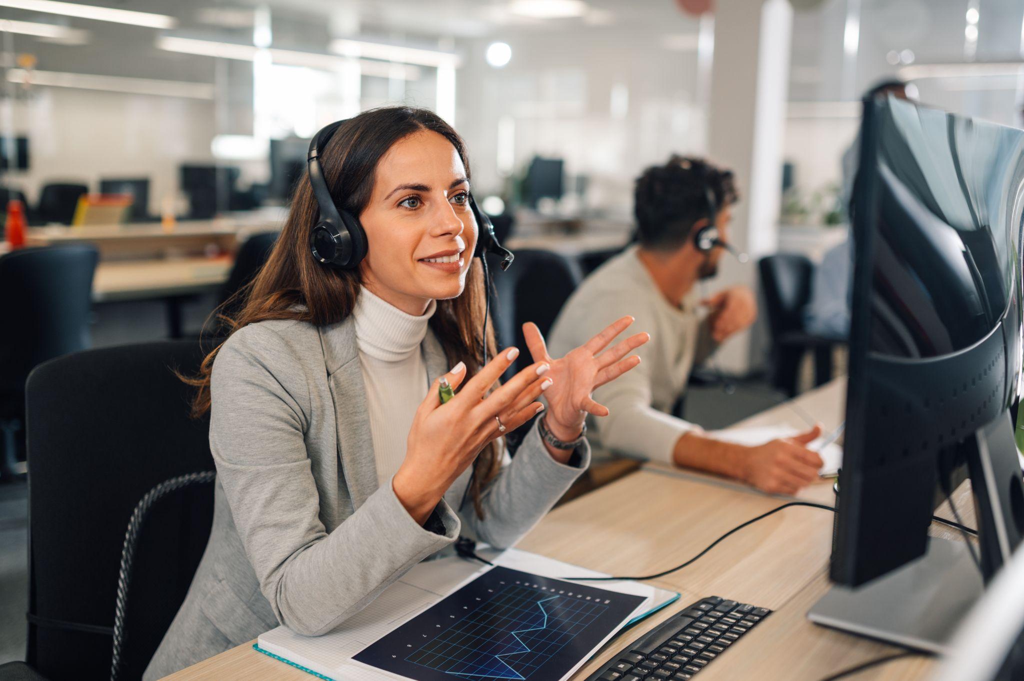 A live answering agent handling customer calls as part of a 24/7 phone answering service.