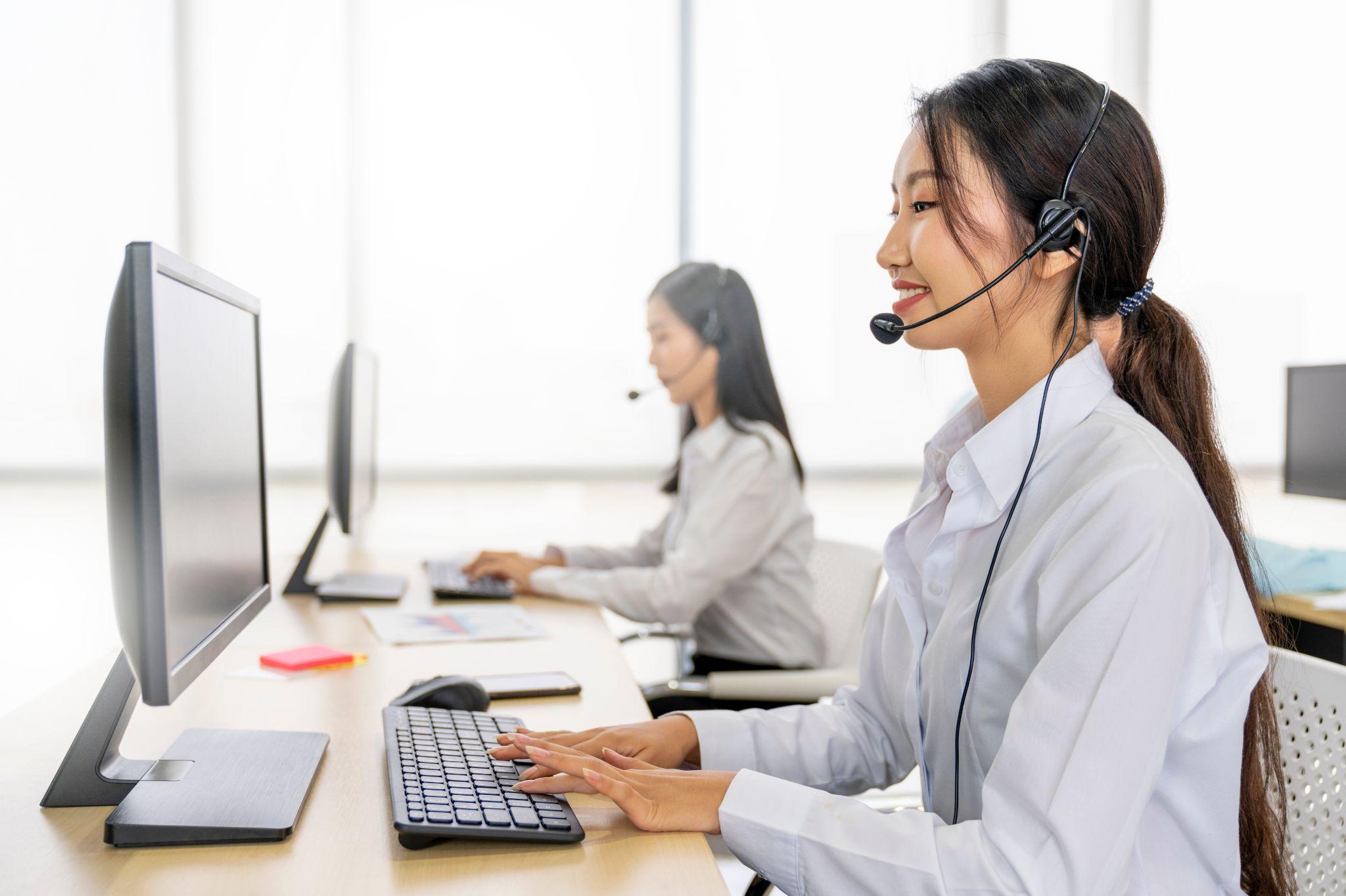 Customer support agents providing live call answering service beyond regular business hours.