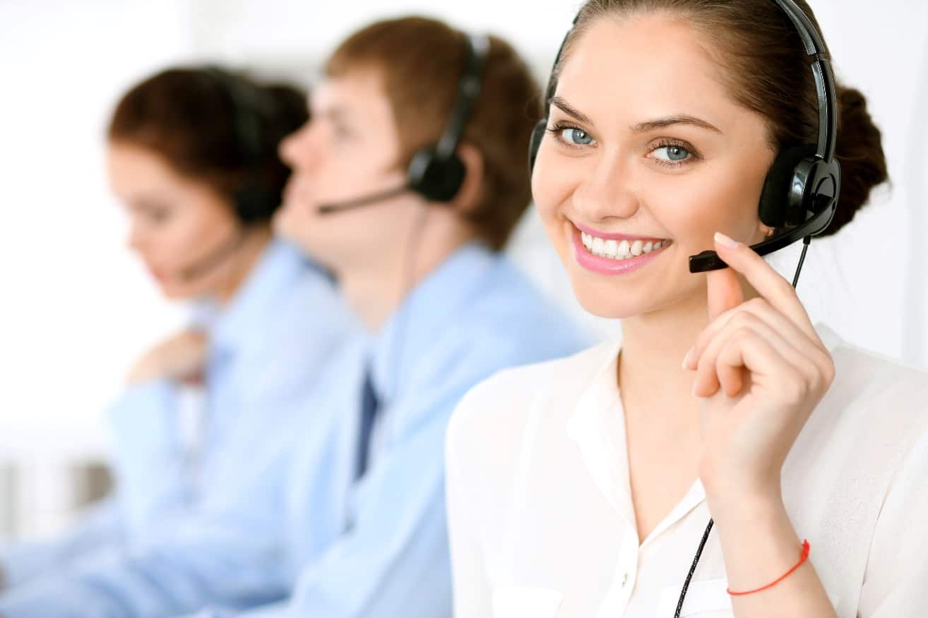 call center operators focus at brunette business woman in headset