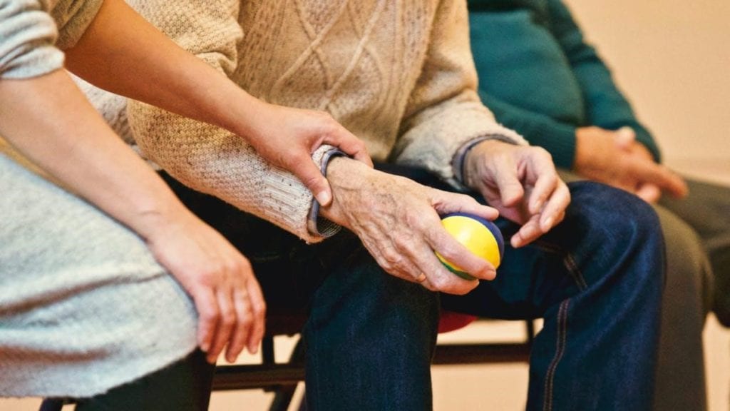 home health care worker with an elderly patient