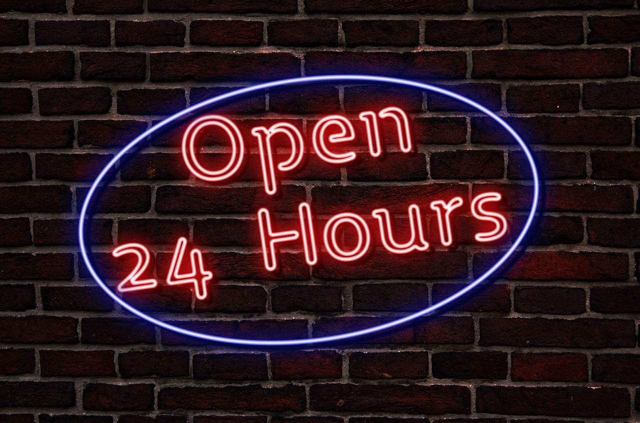 "Open 24 hours" colorful sign