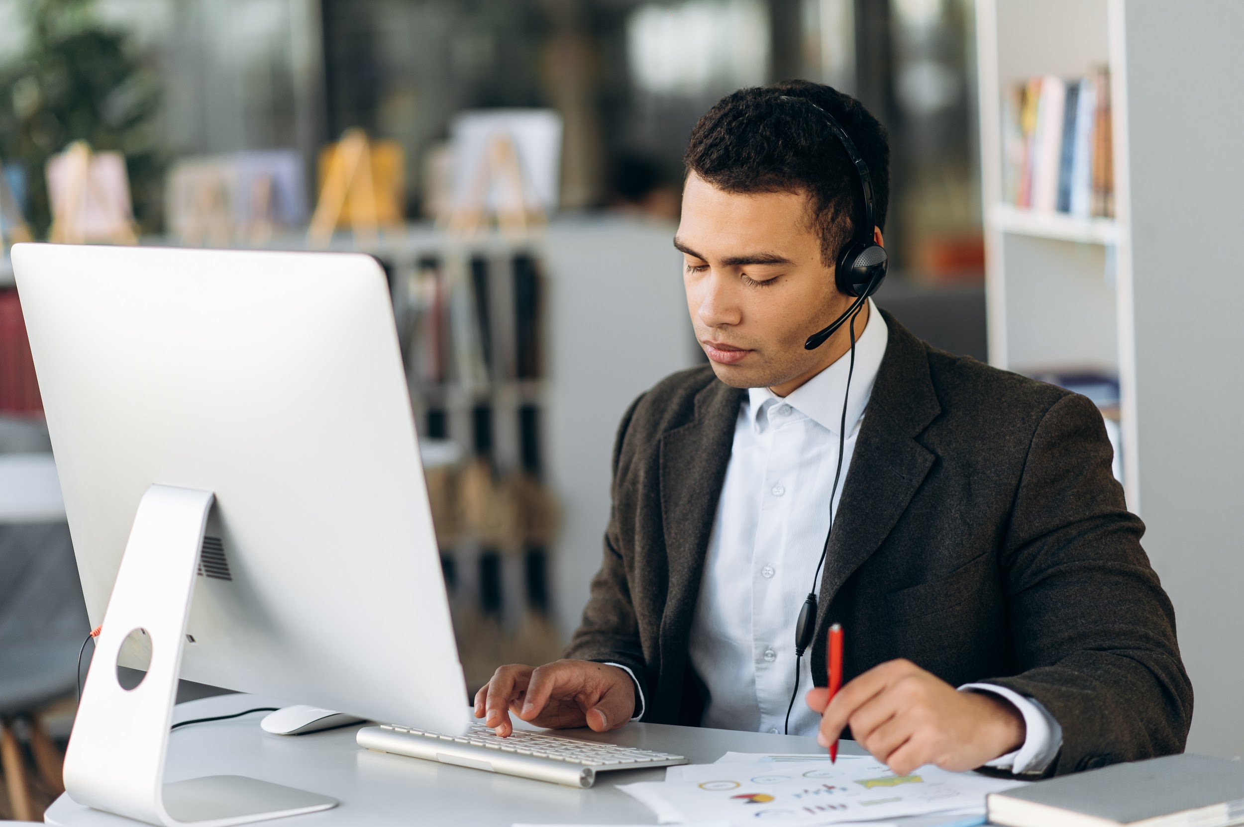 businessman looking at financial graph during online business conference