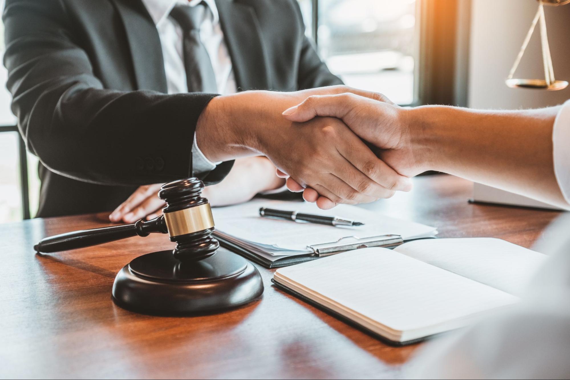 Businessman shaking hands to seal a deal.