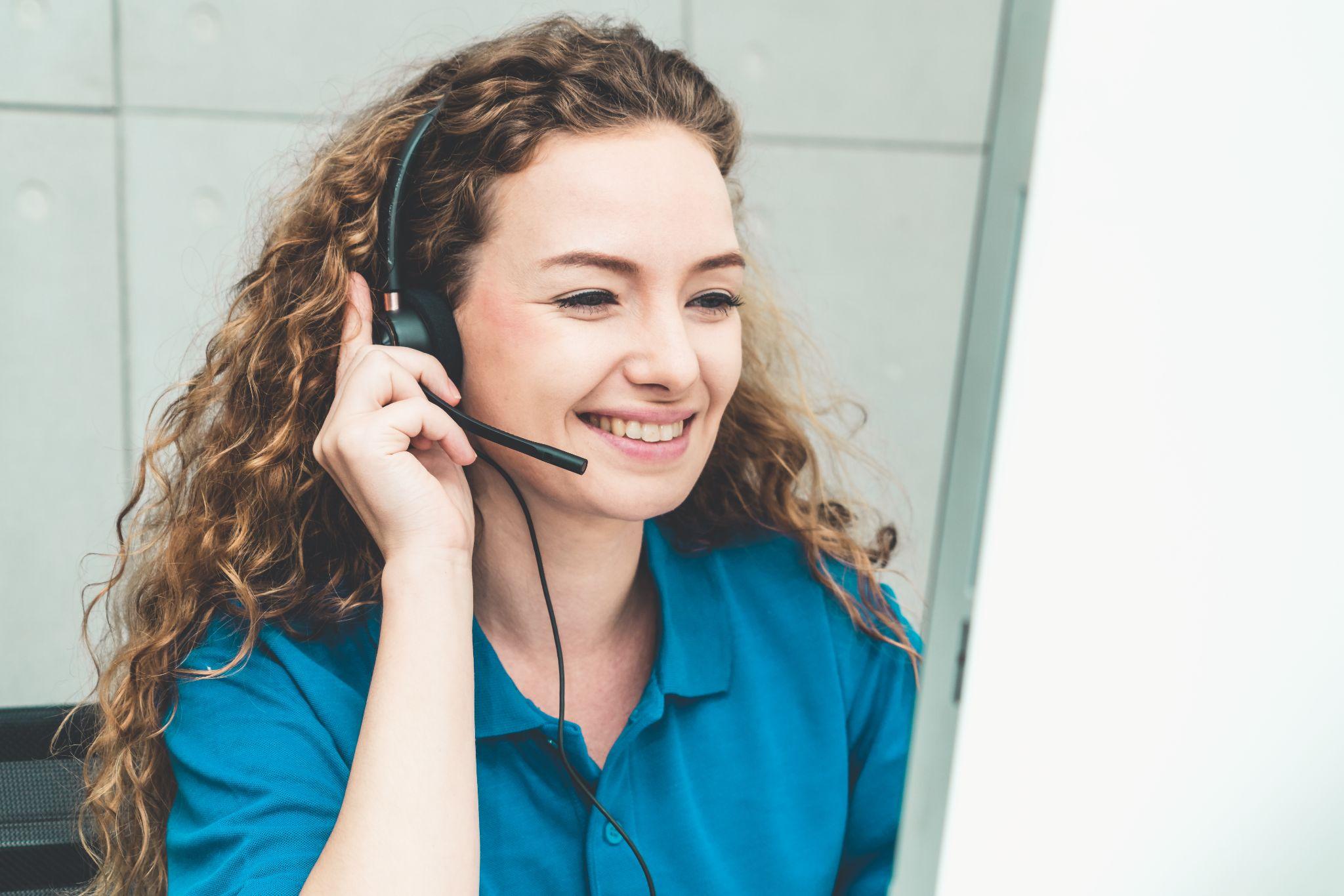 Business people wearing headset working in office to support remote customer