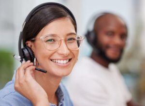 Employee with smile at call center.