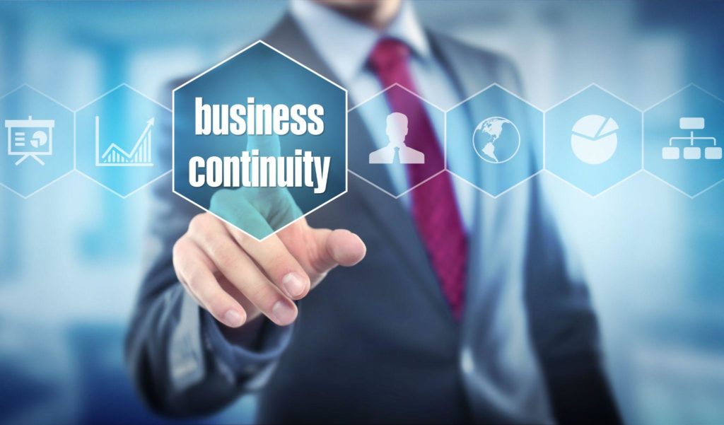 business continuity businessman touching screen