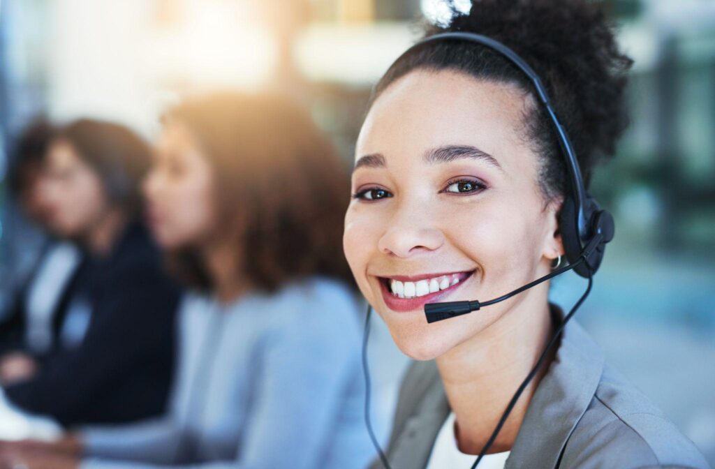 Female telephone answering receptionist with headset.