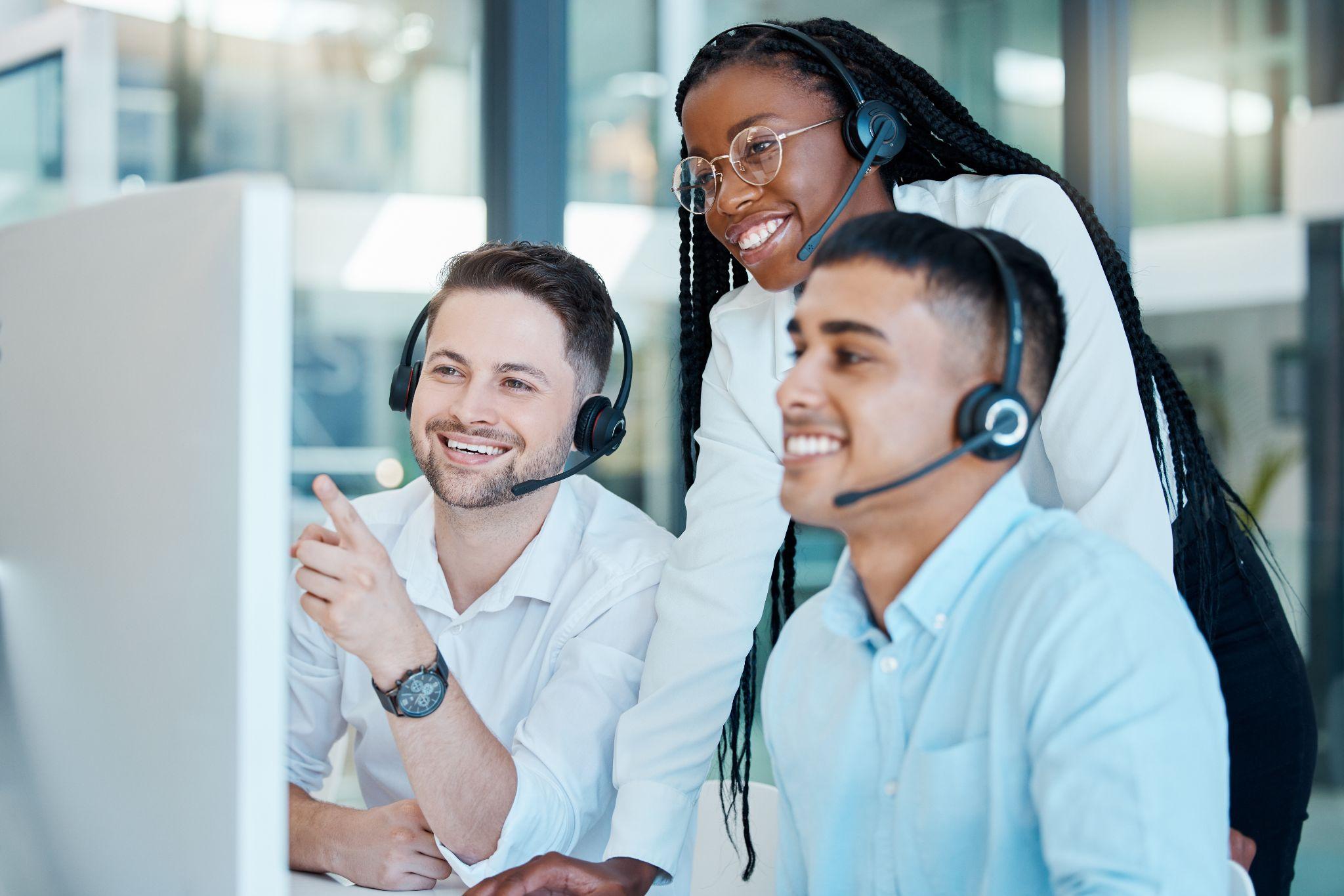 A team of receptionists learning best practices for answering business calls.