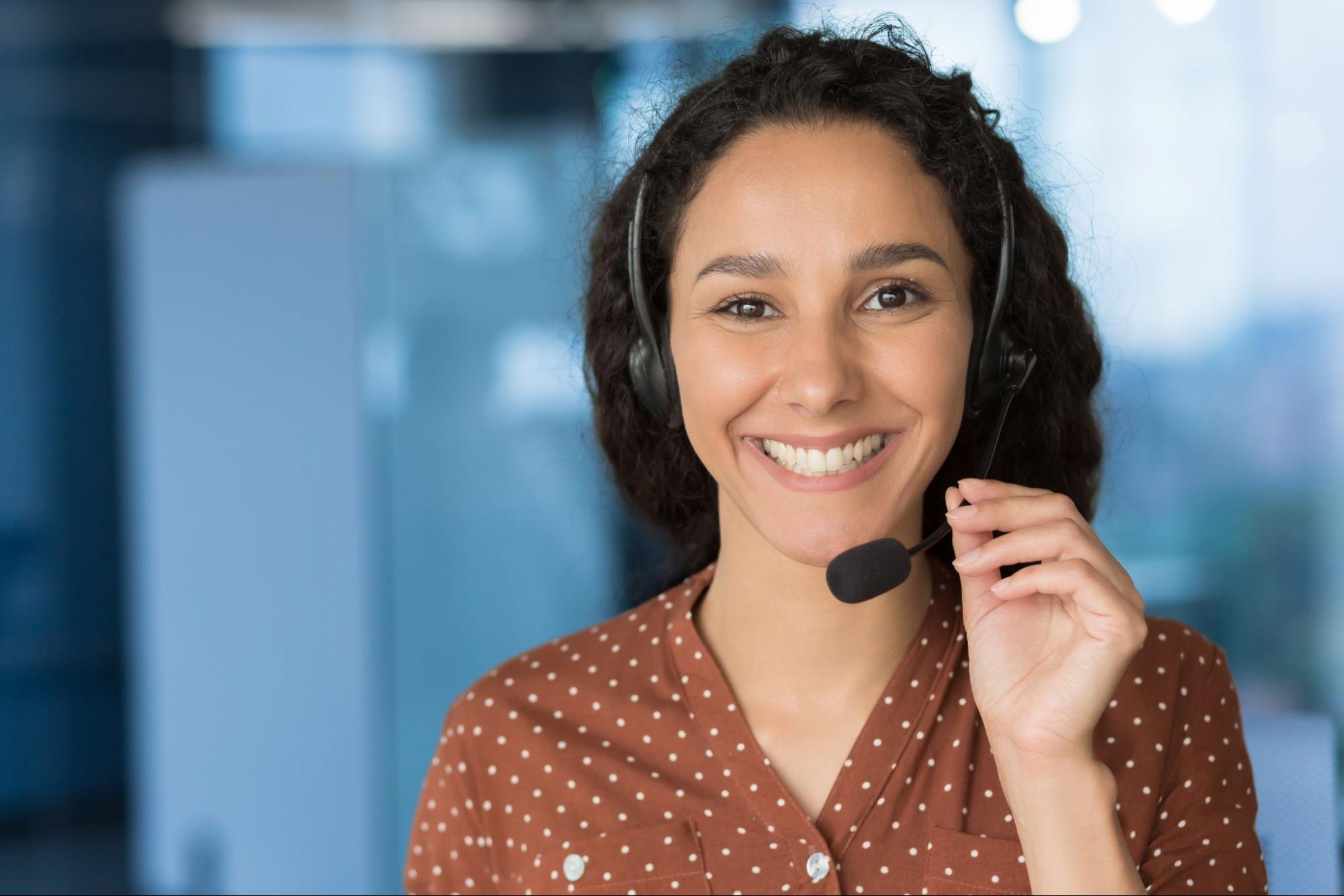 Close up photo portrait of young beautiful woman, business woman smiling and looking at camera.